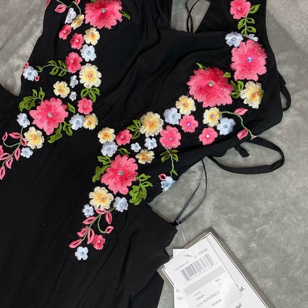 Long slit dress. New with tags. Perfect condition.